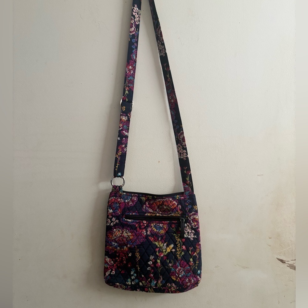 Vera Bradley Hipster Crossbody purse in the Midnight Wildflowers pattern.